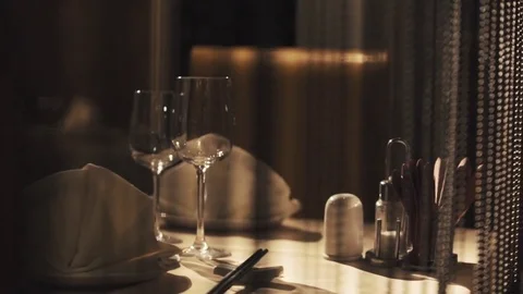 Plates, glasses and chopsticks served on table in chinese restaurant Stock Footage