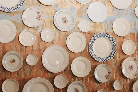 Plates hanging on a wall Stock Photos