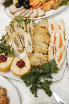 Plates hold assorted appetizers and sandwiches Foto stock
