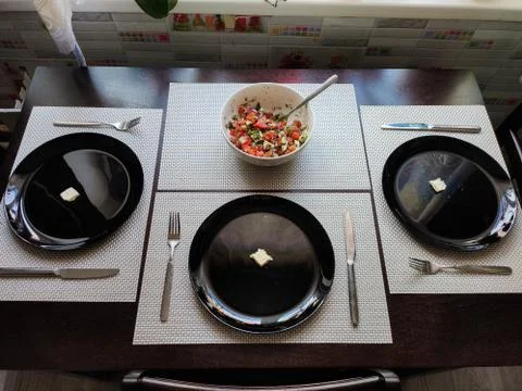 Plates on the home kitchen table Foto stock