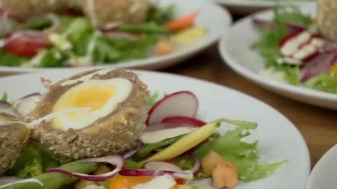 Plates with scotch eggs Stock Footage 79507309