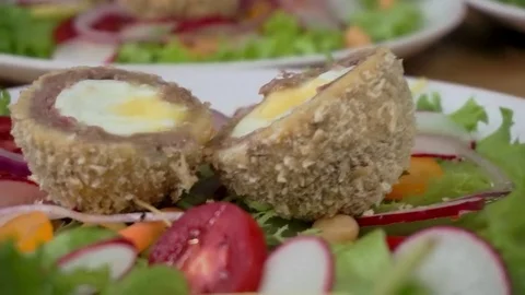 Plates with scottish eggs Stock Footage 79507272