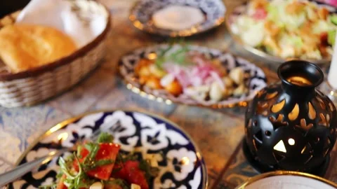 Plates with soup, vegetable dishes and seafood on table, close up Stock Footage 276365239