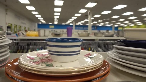 Plates Stacked On Top Of Each Other For Sale Inside Store 4K Stock Footage 88949326