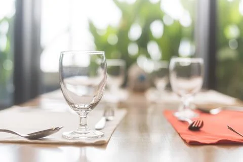 Plates on table in restaurant Stock Photos