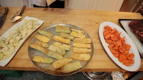 Plates of vegetables on table Stock Footage 113056468