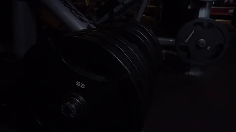 Plates of weight in gym Stock Footage 118857010