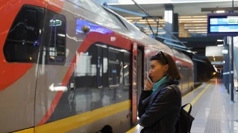 Platform and empty regional train on path Stock Footage 98914395