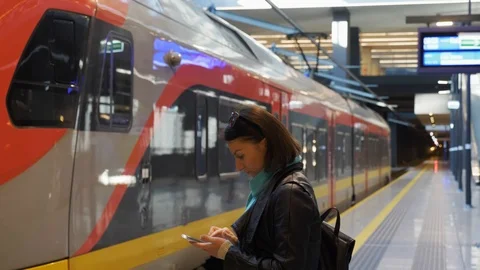 Platform and empty regional train on path Stock Footage 98914477