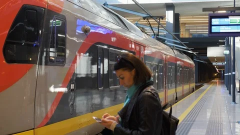 Platform and empty regional train on path Stock Footage 98914761