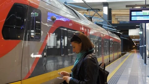 Platform and empty regional train on path Stock Footage 98914919