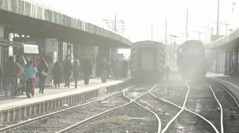 Platform and railway lines at a railway station at dusk. Stock Footage 12715664