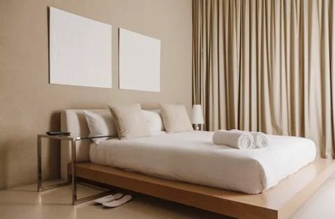 Platform bed in modern bedroom Stock Photos