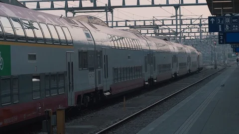 Platform of the city station in the evening Stock Footage 107658030