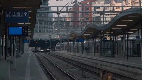 Platform of the city station in the evening Stock Footage 107672550