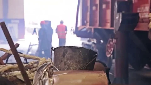 Platform of a freight train with a container of freight trains in a warehouse in Stock Footage 80450790