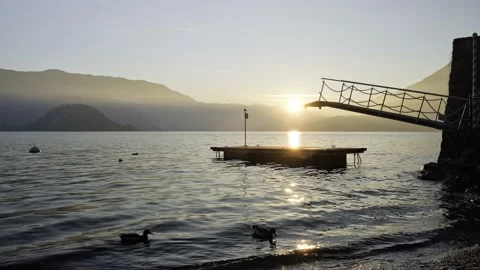Platform on the lake at sunset Video stock 165512607