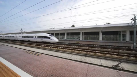Platform with moving high speed train Video stock 166139413