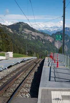 Platform one train tracks at mount rigi kaltbad station facing down the mount Stock Photos