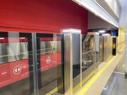 Platform screen door or Automatic platform gate at Metro station of Line Stock Photos