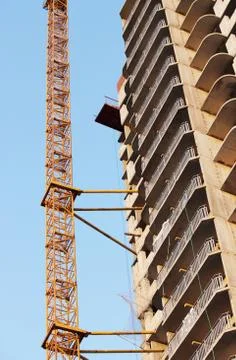Platform for taking heavy load with a crane in the construction multi-storey Stock Photos