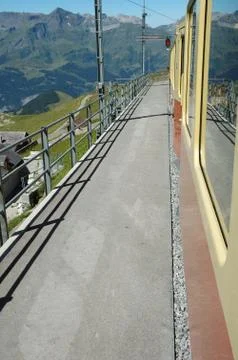Platform on train station between Kleine Scheidegg and Jungfraujoch pass in S Stock Photos