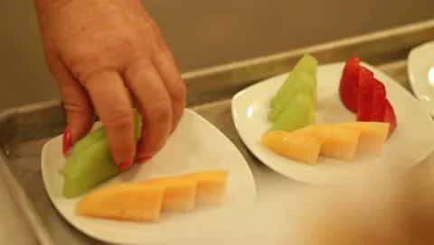 Plating and serving of a fruit tray at a luxury resort in Sonoma 스톡 동영상 10915415
