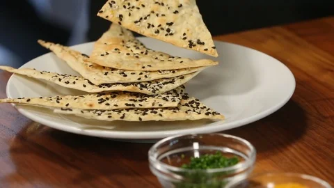 Plating and unplating gourmet bread chips Stock Footage 87536909