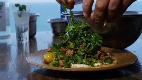 Plating Gyro on pita bread 4K Stockbeeldmateriaal 74579699