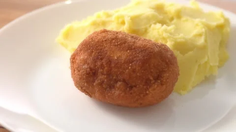 Plating Kiev Cutlet with Mashed Potatoes. Stock Footage 258651401