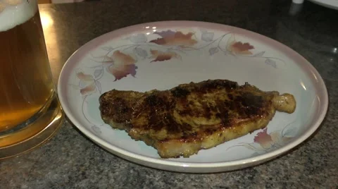 Plating up the steak meal Stock Footage 47442677