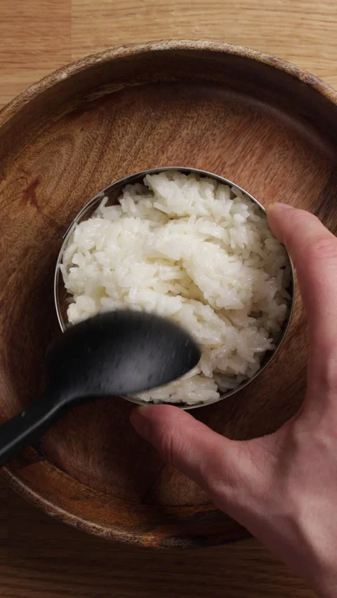 Plating Sticky Rice On Plate Vertical Top View Medium Shot Stock Footage 335081500