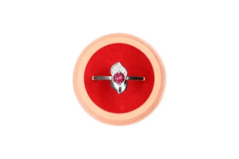 Platinum ring in box with red stone and attractive design Stock Photos