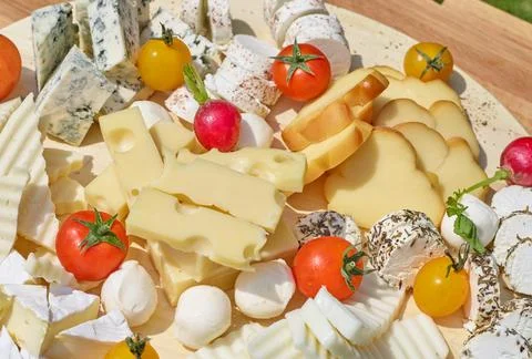 Platter with cheese Stock Photos