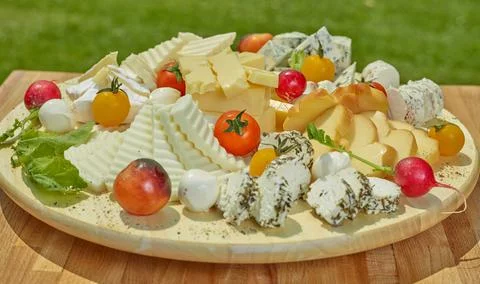 Platter with cheese Stock Photos