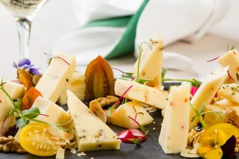 Platter with different types of cheese Stock Photos
