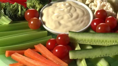Platter of raw vegetables with dip Stock Footage 8572136