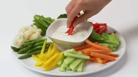 Platter of raw vegetables with dip Stock Footage 8572235
