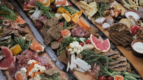 Platter with Spanish ham jamon serrano or Italian prosciutto crudo, sliced Video stock 111764242