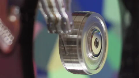 Platters and moving head of computer hard drive disk with colorful reflections Stock Footage 204944258