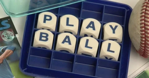 Play Ball - Spelled out in Boggle game with baseball cards Video stock 171729460