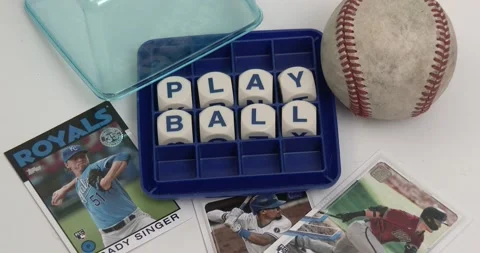 Play Ball - Spelled out in Boggle game with baseball cards - Wide Shot Video stock 171729462