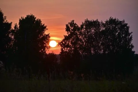 The play of colors in the sky at the time of sunset over the horizon Stock Photos