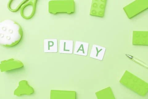 Play concept with toy and objects for child education concept on green backgr 库存照片