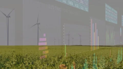 On play data panels sliding across yellow crop field while turbines shifting to Stock Footage 333444406
