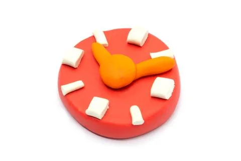 Play dough Clock on white background. Icon clock. Handmade clay plasticine Stock Photos