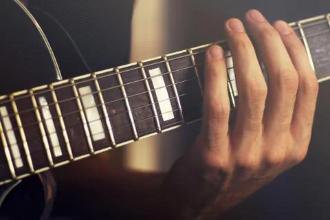Play on electric guitar, close-up. Vintage concept Stock Photos