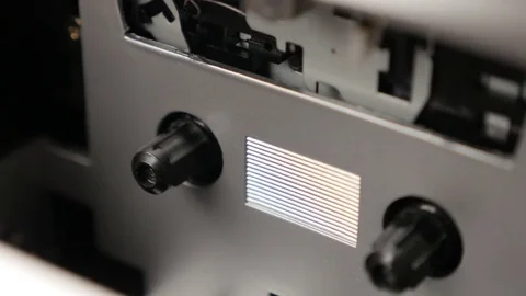 Play function with supply spindle rotating slow tilt Stock Footage 72947258