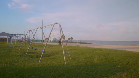 Play ground by the beach , swing sets . Stock Footage 209759447