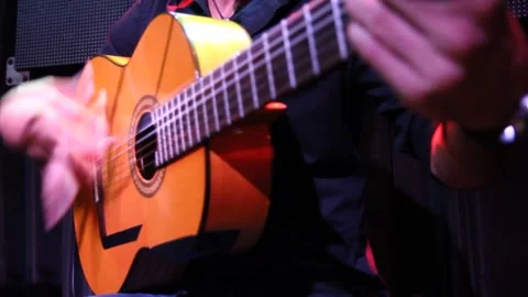 To play the guitar 3 Stock-Footage 310333795